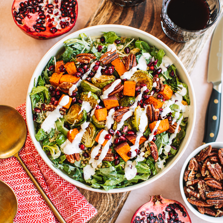 Taylor Farms Holiday Giveaway promotional graphic featuring fresh produce and festive elements.