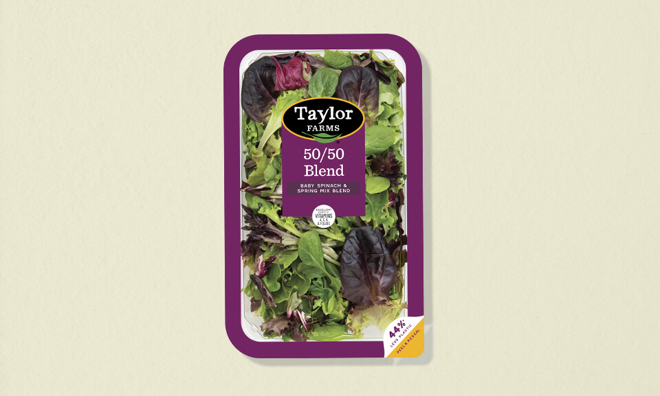 Fresh and colorful Taylor Farms 50/50 salad blend with resealable packaging, perfect for healthy meals and snacks.