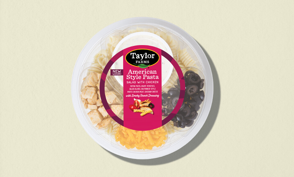 Single-serve American Style Pasta bowls featuring vibrant packaging and a colorful background.