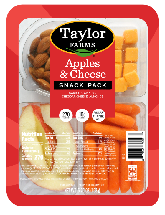 Fresh apples and cheese arranged on a wooden board for a delicious snack or appetizer.