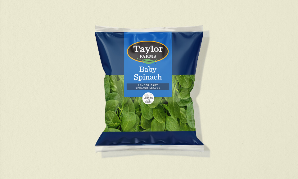 Fresh baby spinach leaves in a 6oz package for salad blends, ideal for healthy meals and nutritious recipes.