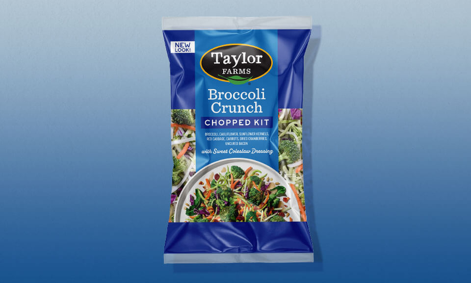 Chopped Broccoli Crunch Salad Kit with vibrant gradient packaging showcasing fresh ingredients.