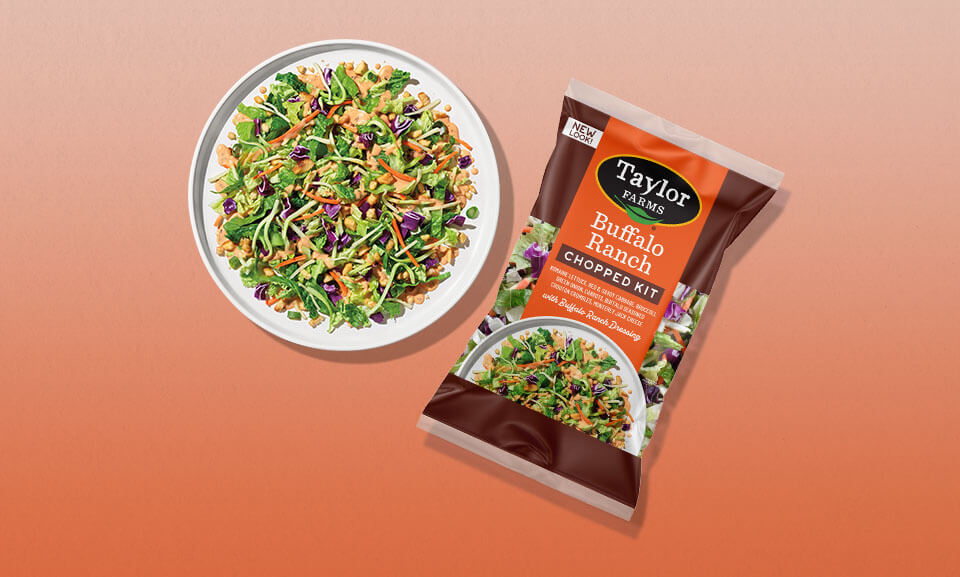 Buffalo Ranch Chopped Salad Kit served on a plate with colorful fresh veggies and ranch dressing.