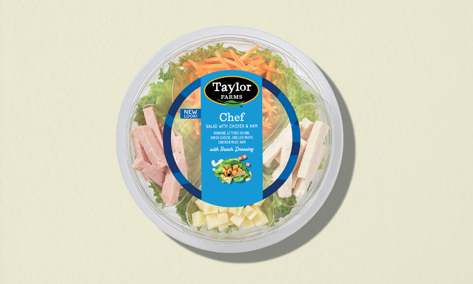 Single-serve bowl featuring chef-crafted chicken and ham with colorful background, perfect for quick, convenient meals.