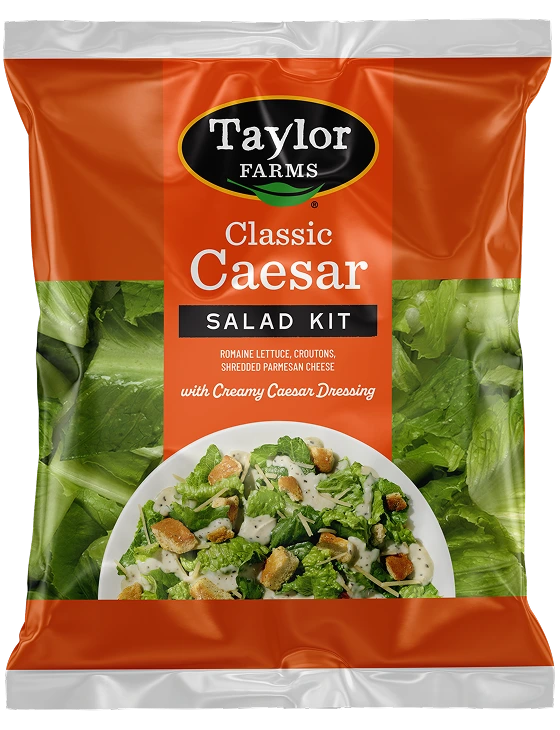 Fresh Classic Caesar Salad Kit featuring crisp romaine lettuce, Caesar dressing, and crunchy croutons.