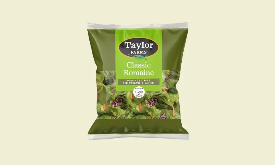 Fresh Classic Romaine Salad Blend in a 9 oz packaging from Taylor Farms, perfect for healthy salads and meal prep.