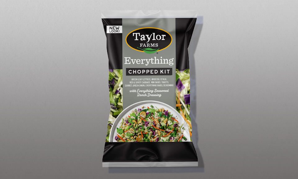 Everything Chopped Kit with fresh vegetables and salad ingredients, vibrant colors in a gradient background.