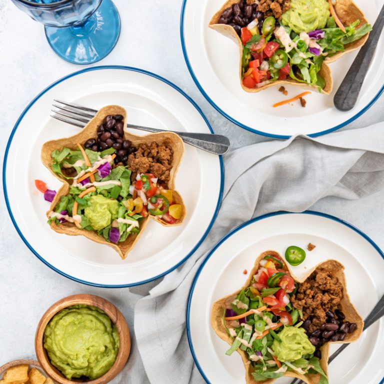 Delicious Guac Crunch Tostada Salad with fresh ingredients from Taylor Farms, perfect for a healthy meal.