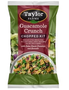 Creamy guacamole with crispy toppings, perfect for dipping or as a fresh salad addition.