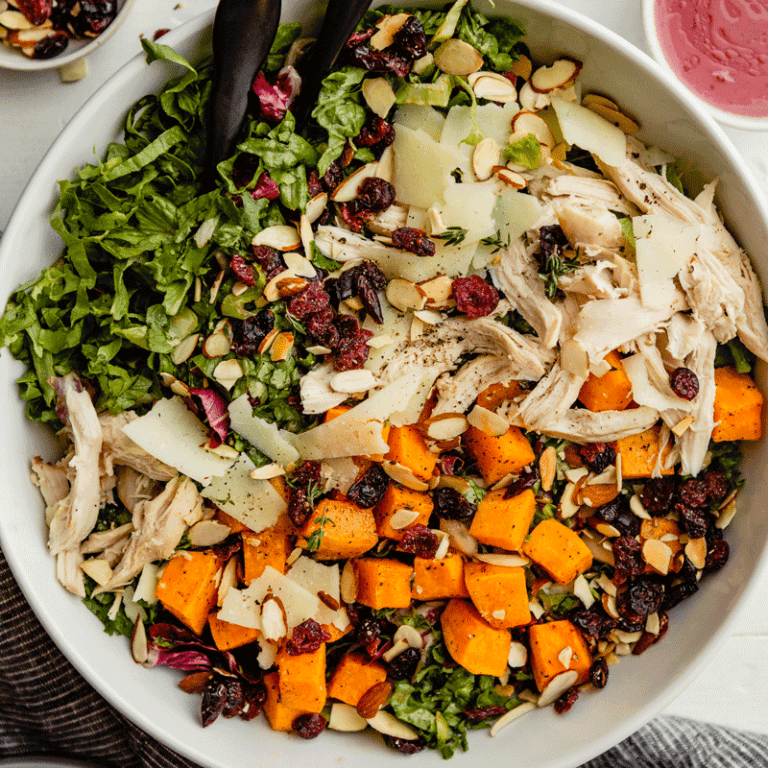 Delicious leftover turkey rose salad topped with colorful vegetables and a light dressing, ideal for holiday meals.