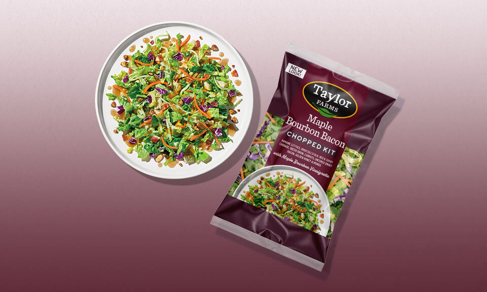 Maple Bourbon Bacon Chopped Kit served in a bowl, showcasing fresh ingredients and vibrant colors for a delicious meal option.