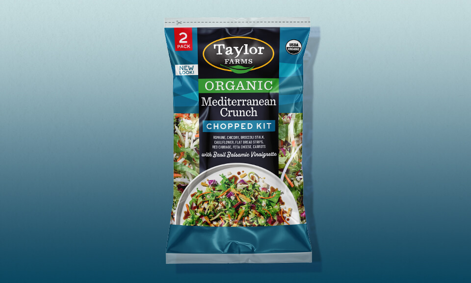 Organic Mediterranean Crunch Chopped Salad Kit from Taylor Farms, featuring fresh vegetables and vibrant colors.