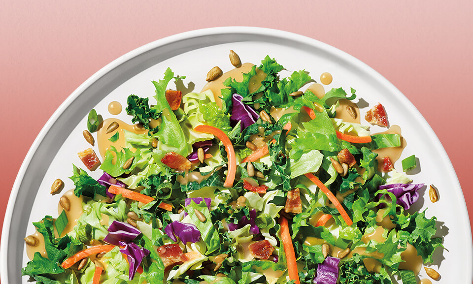 Colorful Sunflower Crunch Chopped Salad kit featuring fresh greens, crunchy toppings, and a vibrant dressing pack.