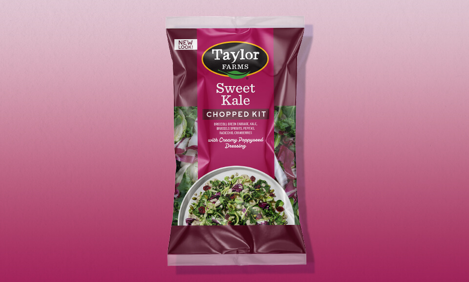 Taylor Farms Sweet Kale Chopped Salad Kit featuring nutrient-rich greens and a colorful gradient packaging design.