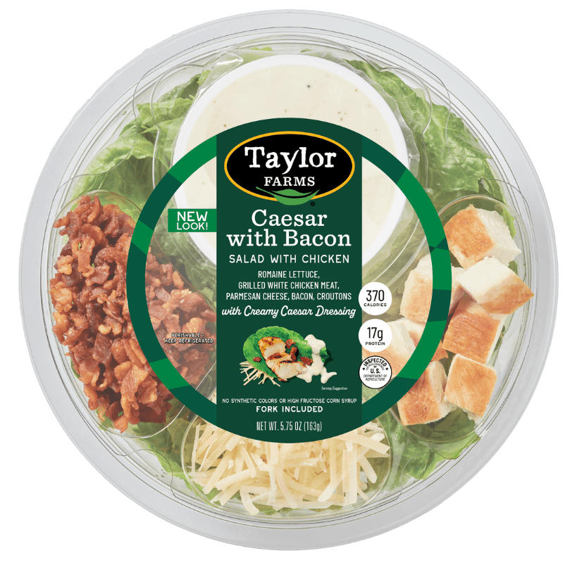 Ready-to-eat Caesar salad bowl with bacon, greens, and dressing from Taylor Farms.