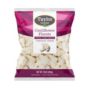 The bag of Taylor Farms Cauliflower Florets showing fresh, trimmed cauliflower florets.