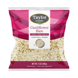 The Taylor Farms Cauliflower Rice package showing fresh cauliflower rice in a sealed plastic bag.