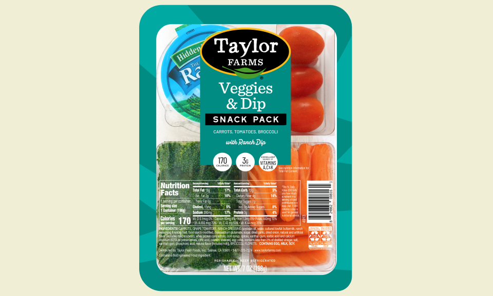 Fresh colorful vegetables with creamy dip served in a stylish platter, perfect for snacks or healthy appetizers.