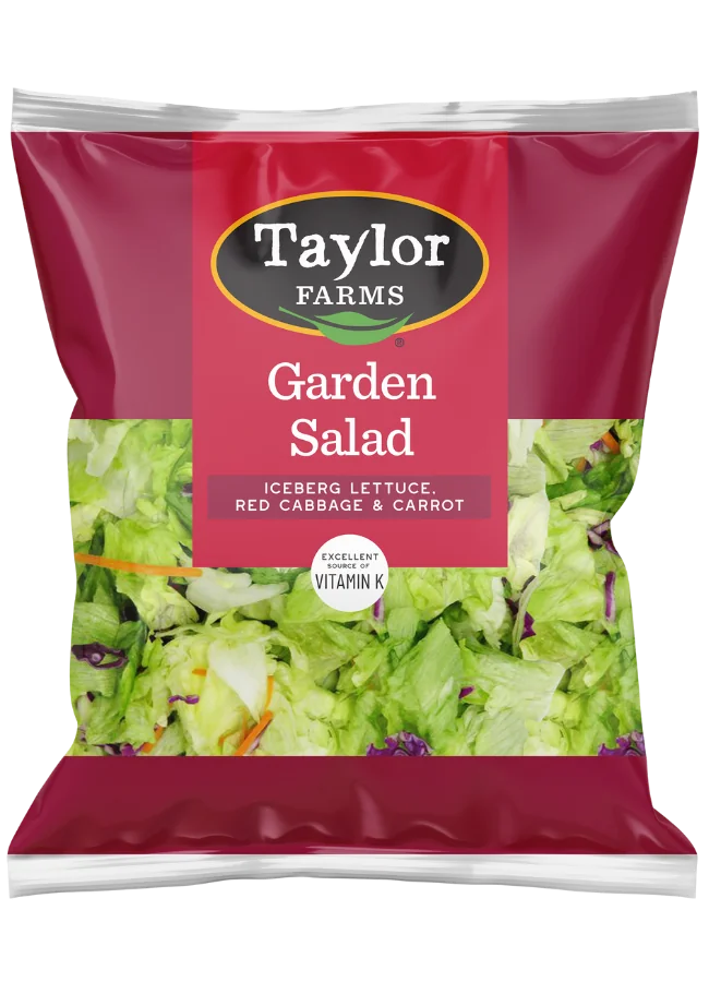 The Taylor Farms Garden Salad blend, featuring crisp iceberg lettuce, red cabbage, and shredded carrot.
