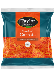 Fresh pre-packaged salad mix from Taylor Farms with vibrant greens and colorful vegetables.
