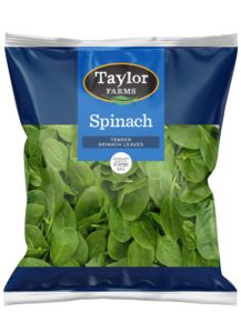 Fresh organic salad mix featuring leafy greens and colorful vegetables in a clear packaging.