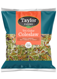 Fresh pre-washed salad mix featuring greens and colorful vegetables, perfect for healthy meals and quick salads.