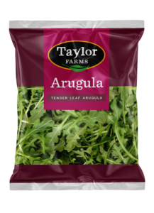 Fresh organic salad blend featuring mixed greens, kale, and colorful veggies from Taylor Farms.