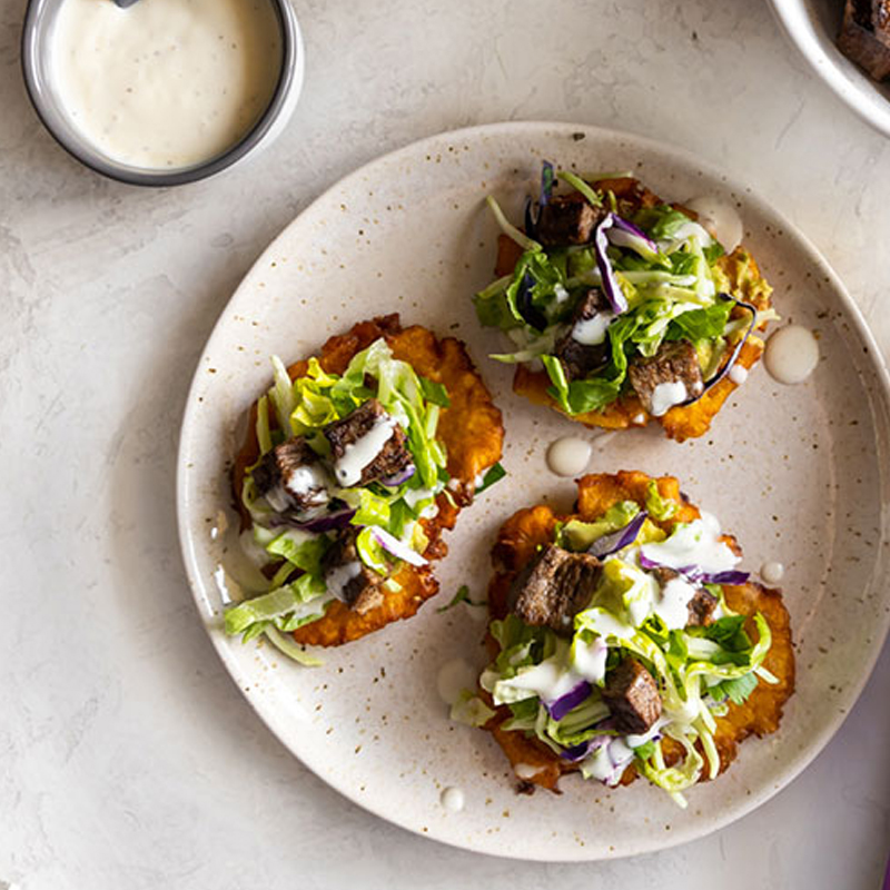 Carne Asada Tostones with Chimichurri Chopped Salad