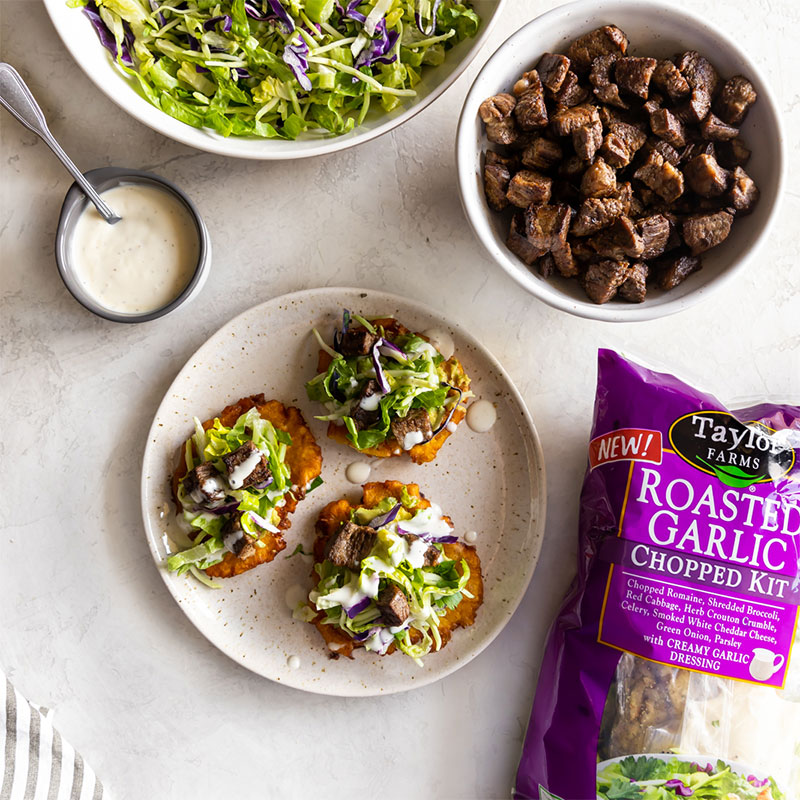Carne Asada Tostones with Roasted Garlic Chopped Salad Header Image