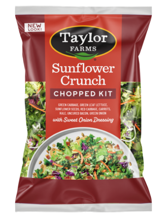 The Sunflower Crunch Chopped Salad Kit, with fresh green leaf, kale, sunflower seeds, and crumbled bacon tossed with a sweet onion coleslaw dressing.