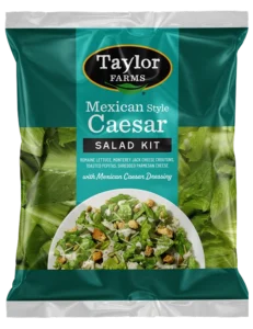Mexican-Style Caesar Salad Kit featuring fresh greens, crunchy tortilla strips, and zesty dressing.
