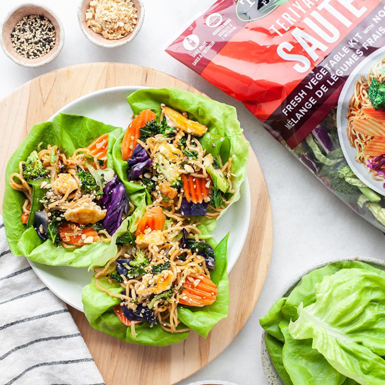 Teriyaki chicken lettuce cups filled with colorful vegetables and herbs, perfect for a healthy and fresh meal option.