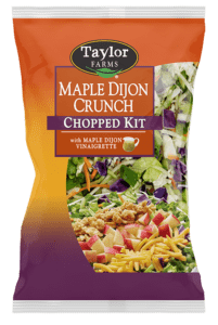 Taylor Farms Maple Dijon Crunch Chopped Salad Kit in a 13.25oz packaging featuring fresh ingredients and vibrant design.