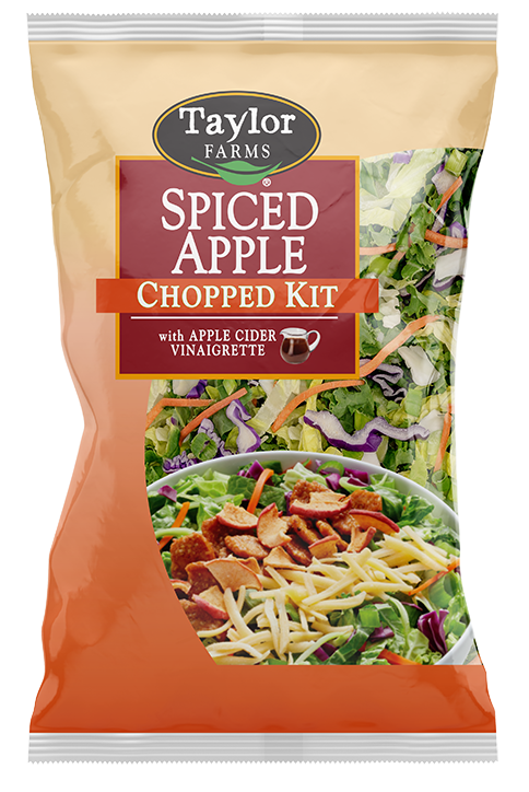 The Spiced Apple Chopped Salad Kit with cabbage, romaine, shredded broccoli, green onion, honey-roasted mini chips, cinnamon-puffed apples, smoked gouda cheese, and an Apple Cider Vinaigrette.