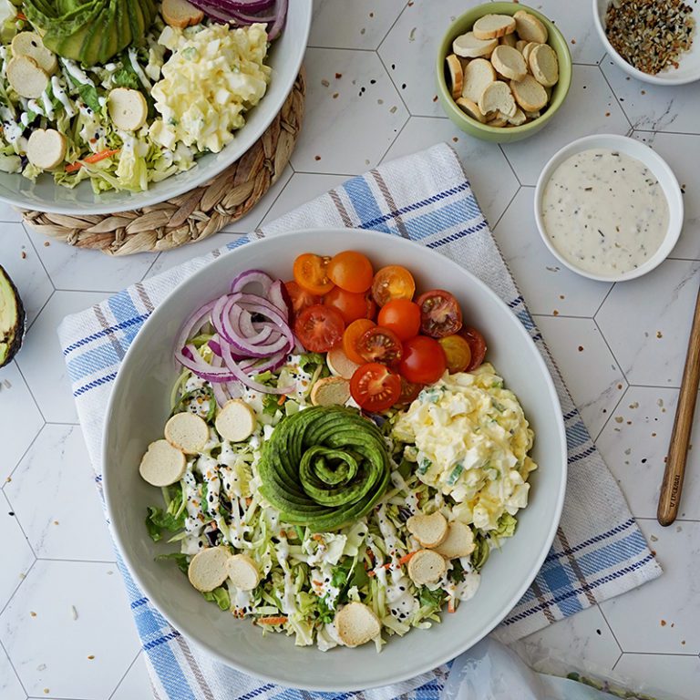 Fresh and colorful vegetable mix from Taylor Farms, featuring broccoli, carrots, and cauliflower for healthy meals.