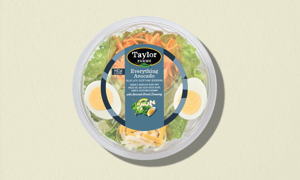 Single-serve avocado bowls from Taylor Farms, featuring fresh ingredients and vibrant packaging on a colorful background.