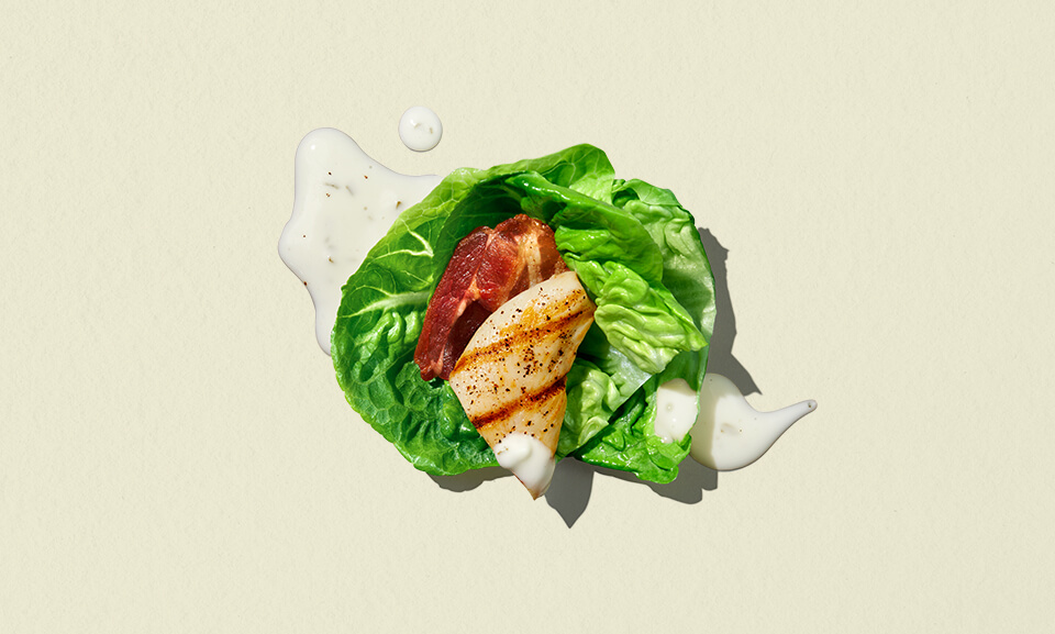 Ranch Chicken Bacon single serve salad bowl with fresh greens, grilled chicken, and crispy bacon bits.