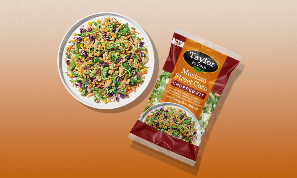 Chopped Mexican Street Corn kit served on a plate, featuring vibrant ingredients and garnishes.