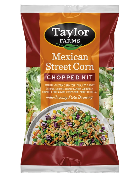 Delicious Mexican street corn topped with spices, cheese, and herbs, showcasing vibrant colors and textures.