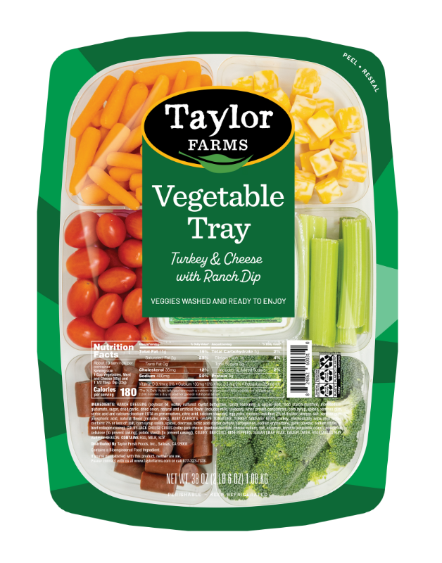 Taylor Farms snack tray with turkey sausage bites, colby-jack cheese cubes, a selection of fresh, crunchy vegetables, and Hidden Valley Ranch dipping sauce.