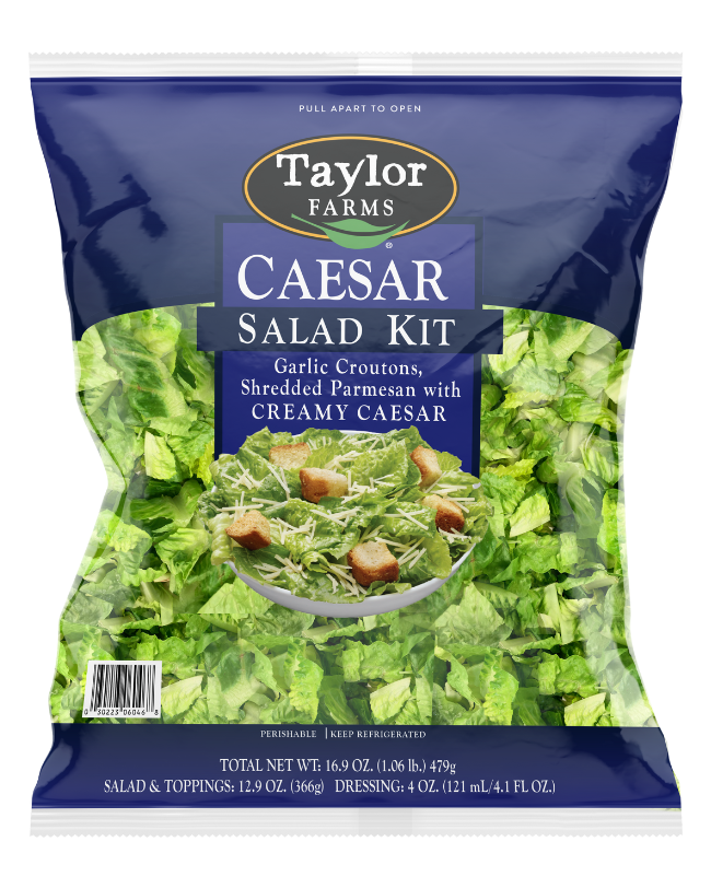 The Taylor Farms Caesar Salad Kit with chopped Romaine lettuce, bite-size croutons, shredded parmesan cheese, and creamy Caesar dressing.