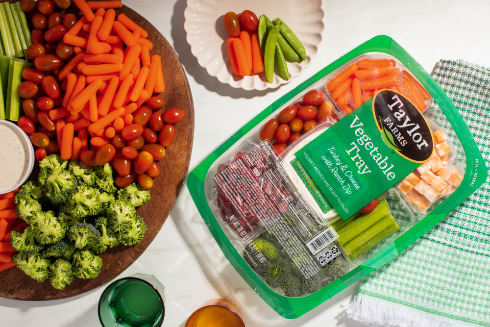 Taylor Farms vegetable tray package with vegetables arranged on a plate