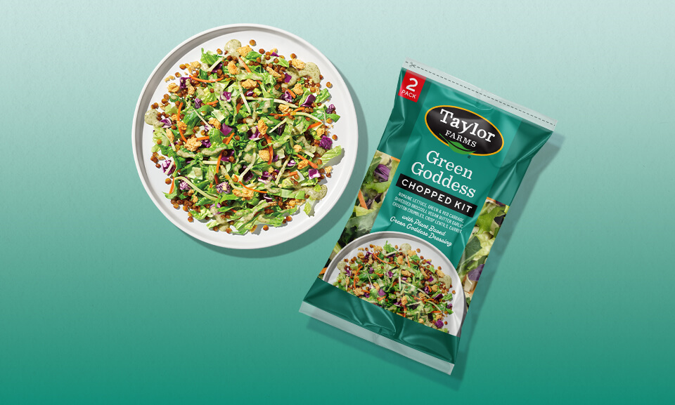 Fresh Green Goddess Chopped Kit with vegetables presented on a plate, ideal for healthy meals and salads.