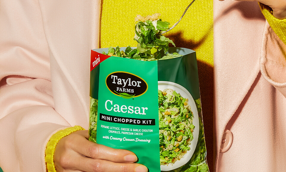 Fresh Caesar Mini Chopped Salad Kit featuring crisp greens, croutons, and creamy dressing for a quick, delicious meal.