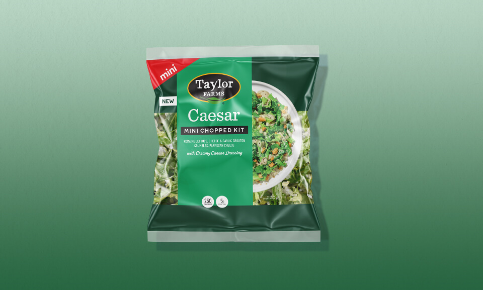 Caesar Mini Chopped Kit with fresh greens and dressing, perfect for convenient and healthy meal solutions.