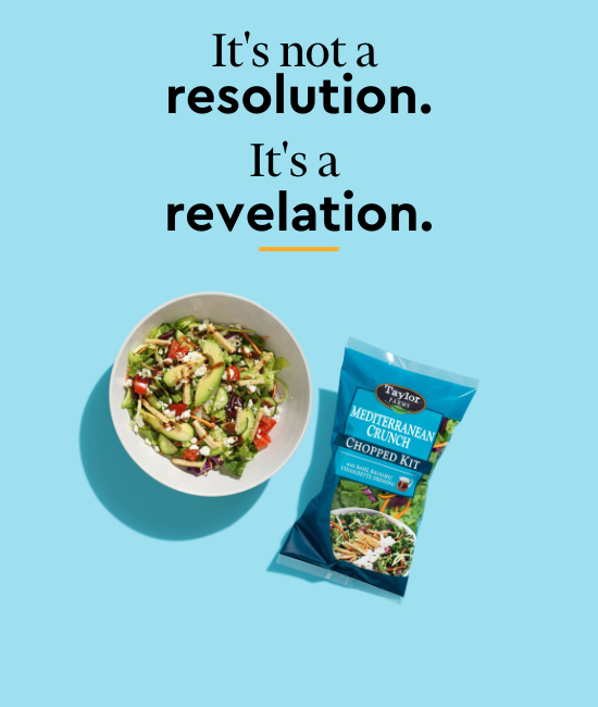A bowl of salad and a bag of salad underneath text on a blue background