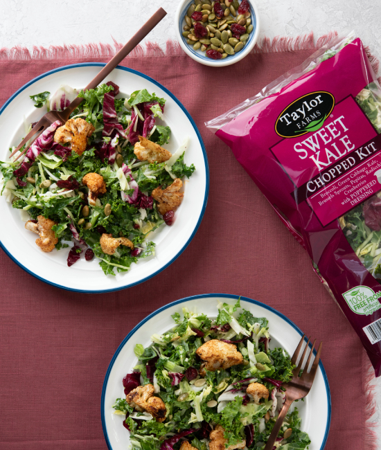 Fresh sweet kale and cauliflower salad mix with vibrant greens and nutritious ingredients.