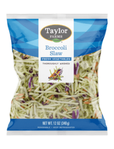 Fresh Taylor Farms broccoli slaw in a colorful bowl, perfect for salads and healthy meals.