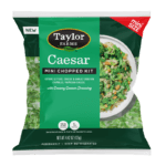 Taylor Farms Caesar Mini Chopped Salad Kit featuring fresh greens, crispy croutons, and Caesar dressing.