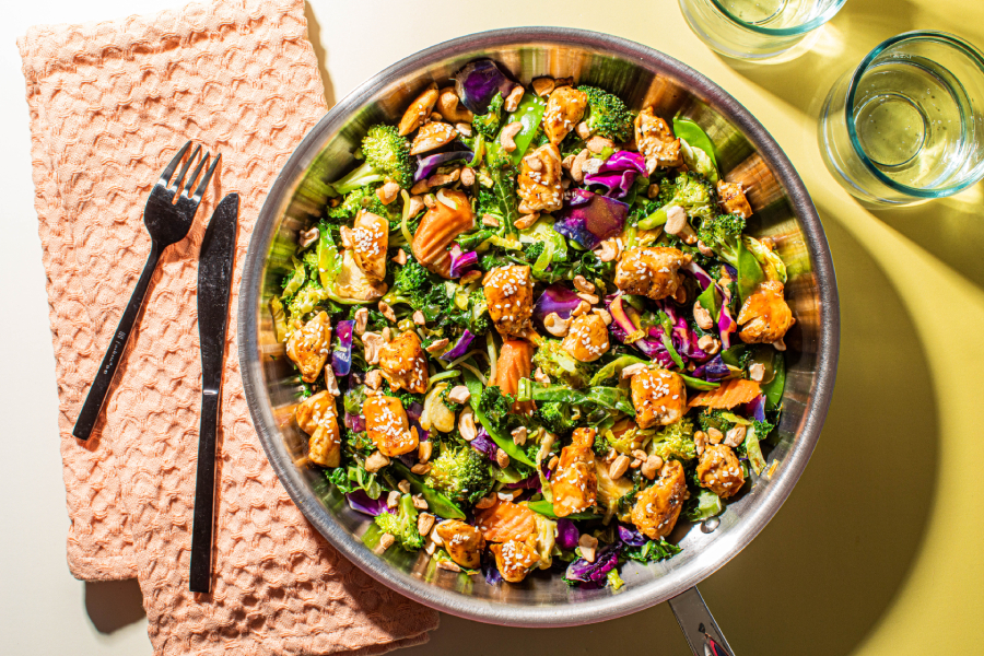 A large bowl of Keto Teriyaki Chicken Stir Fry using the Taylor Farms Keto Teriyaki Cashew Saute Kit.